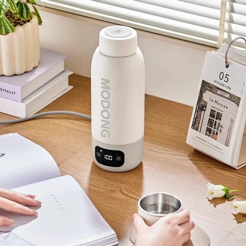 100–240V Electric Kettle 600ML – Portable smart heating cup with adjustable temperature, fast boiling, and universal voltage. Perfect for travel, office, and home use.