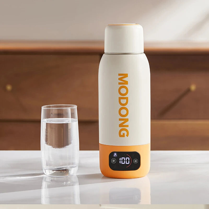 100–240V Electric Kettle 600ML – Portable smart heating cup with adjustable temperature, fast boiling, and universal voltage. Perfect for travel, office, and home use.