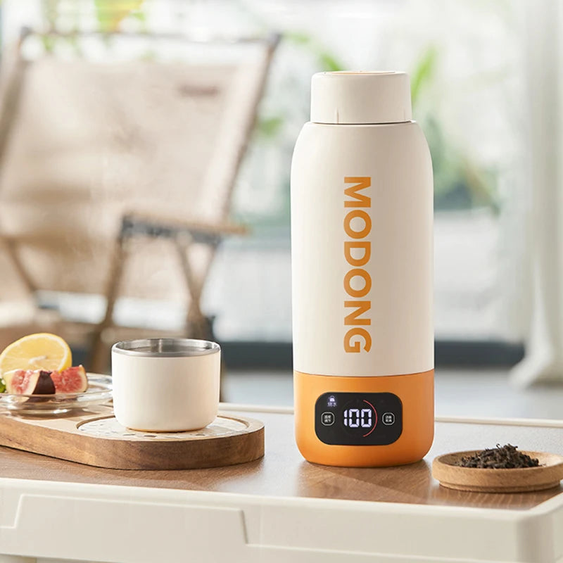 100–240V Electric Kettle 600ML – Portable smart heating cup with adjustable temperature, fast boiling, and universal voltage. Perfect for travel, office, and home use.